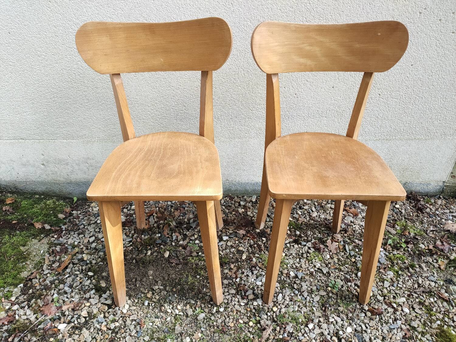Pair of vintage solid wood bistro chairs