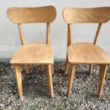 Pair of vintage solid wood bistro chairs