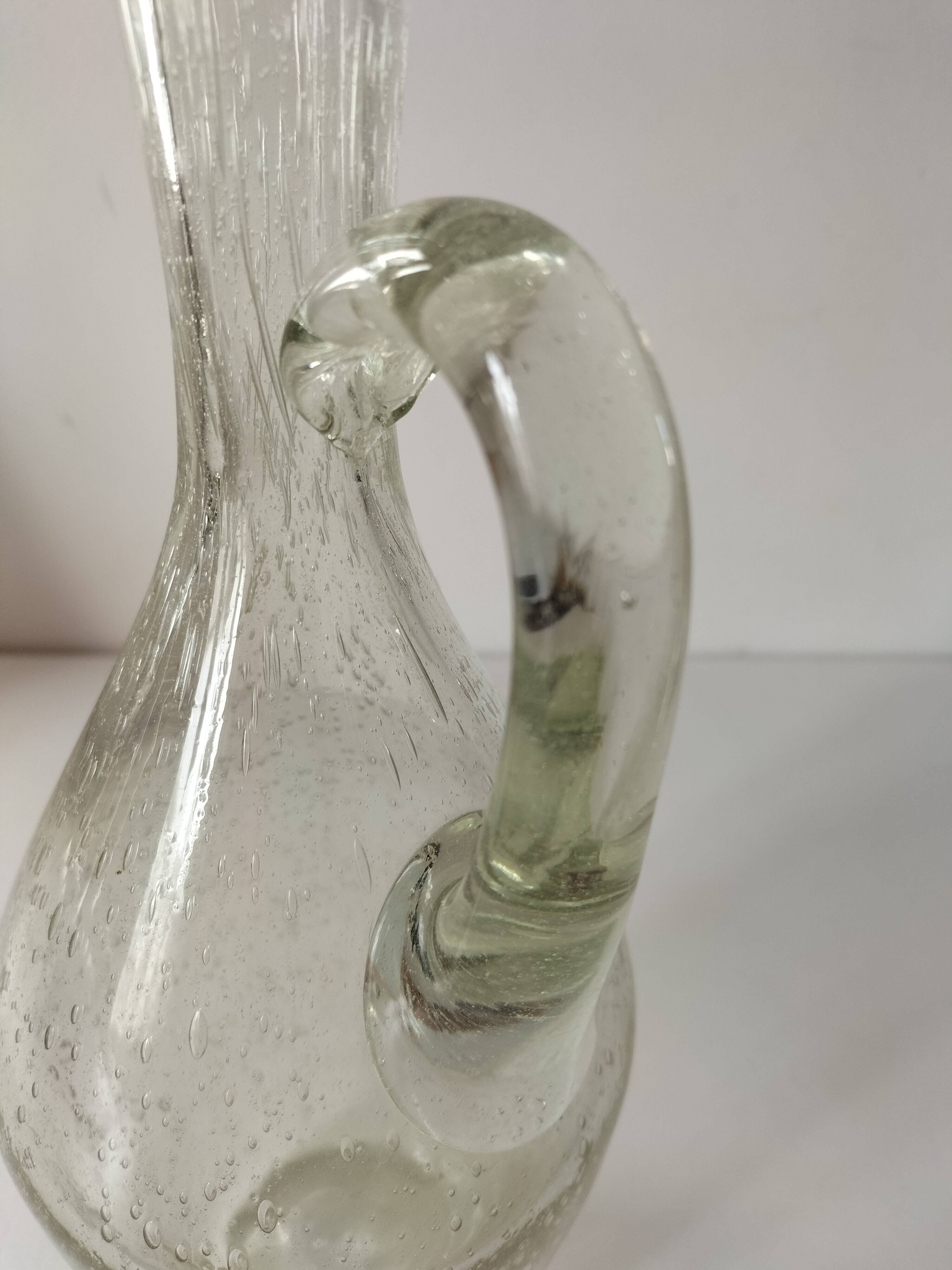 Bubble glass carafe bottle signed Biot in lime green colour.