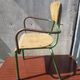 Former green metal child chair