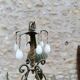 Italian cage chandelier decorated with ceramic roses and glass paste pendants