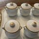 Porcelain tray and 8 matching cream pots. Antique