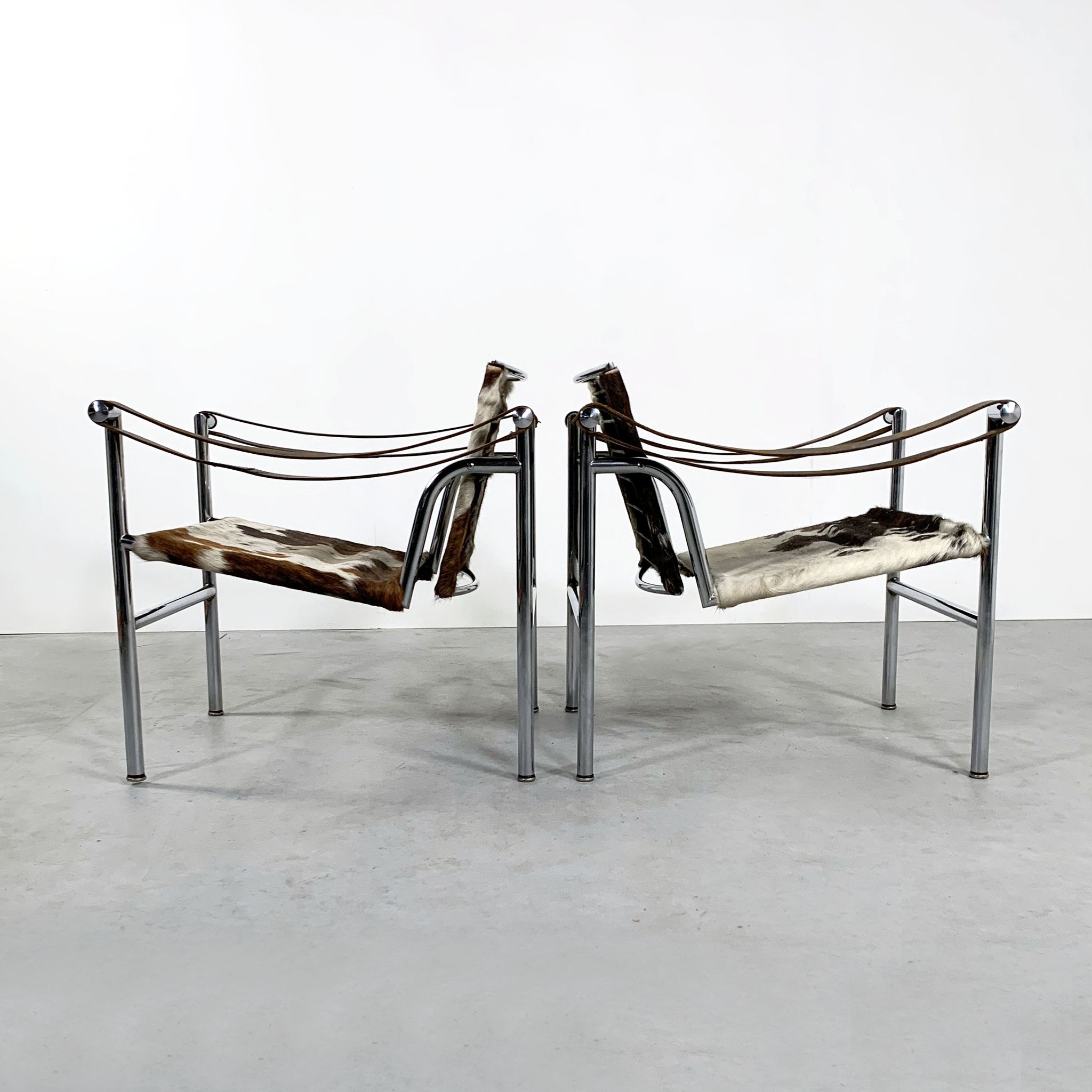 Pair of LC1 cow skin chairs by Le Corbusier for Cassina 1970