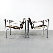 Pair of LC1 cow skin chairs by Le Corbusier for Cassina 1970