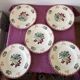 Set of 5 flat plates, signed Longwy.