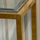 Golden and chrome metal console, bevelled glass, circa 1980.