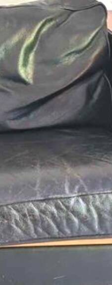 Scandinavian black leather sofa