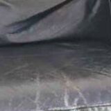 Scandinavian vatage sofa in black leather