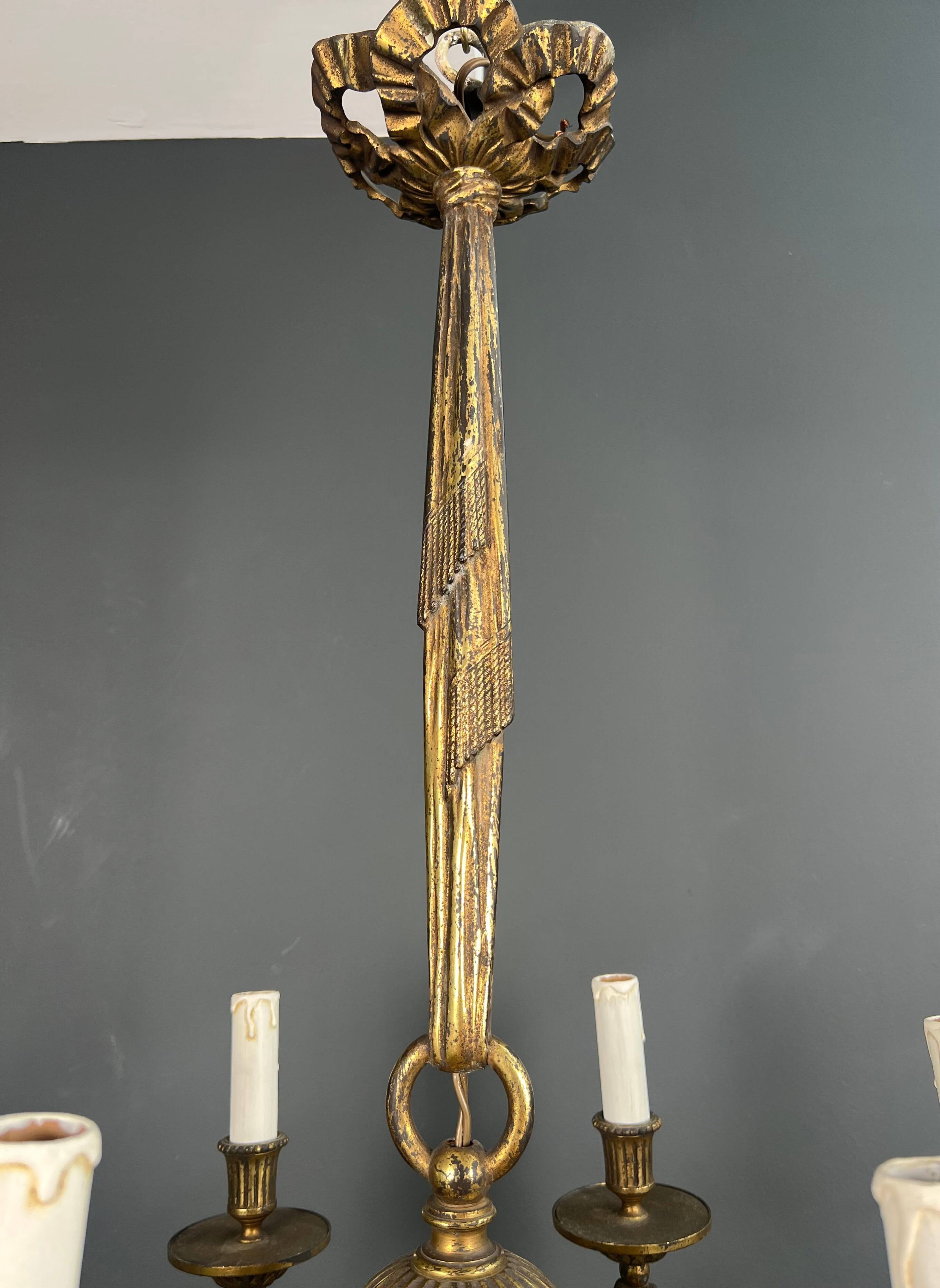Bronze chandelier in Louis XVI style with 6 arms.