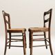 Pair of turned wooden chairs with caning