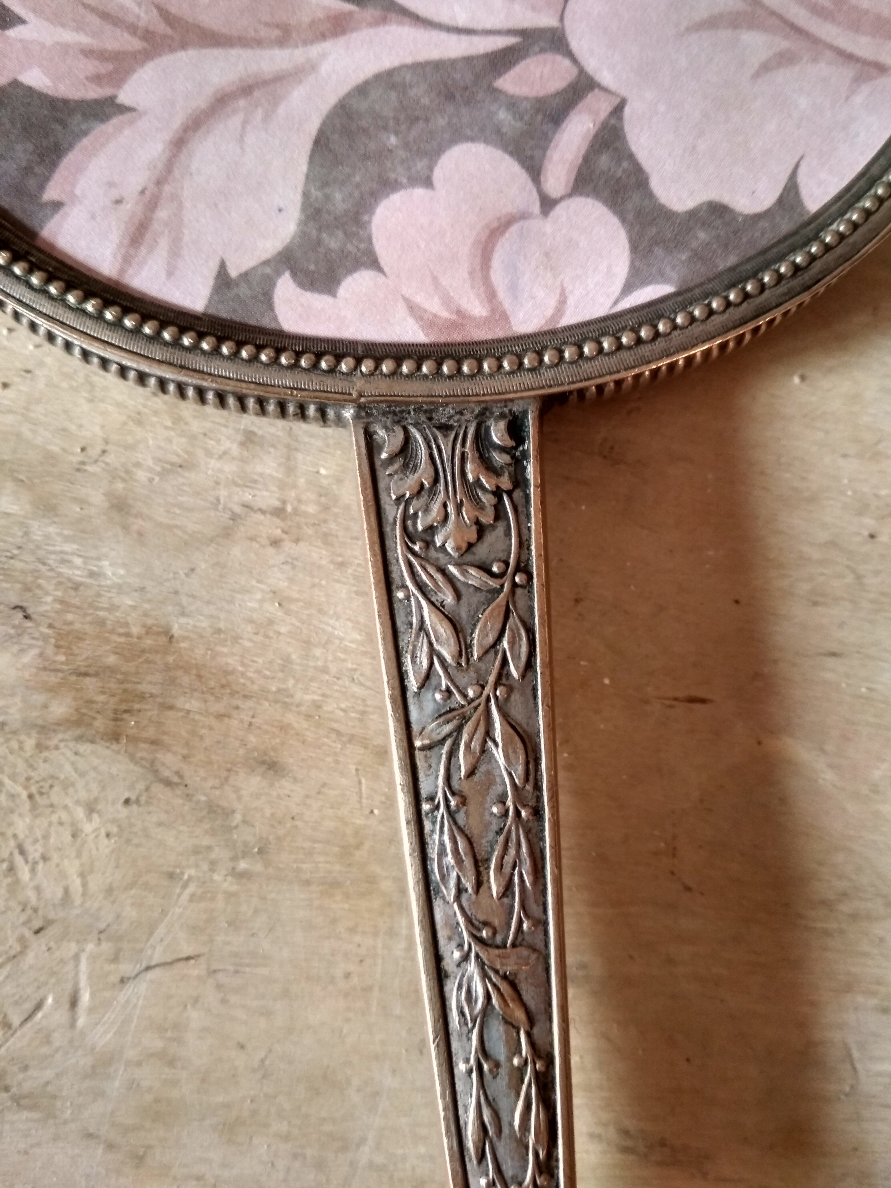 Old hand mirror beveled glass