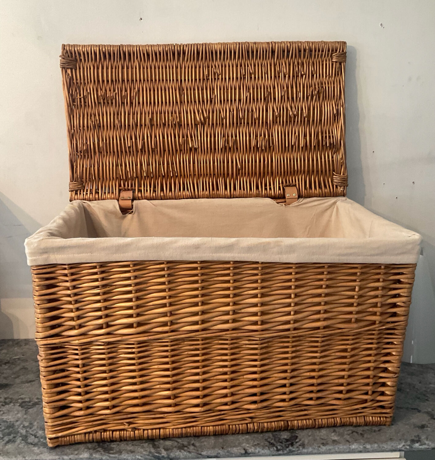 Woven wicker vintage suitcase