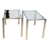 1970s chrome metal side tables with glass tops.