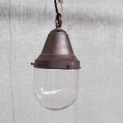 Pair of brass and clear glass industrial pendants