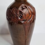 Decorative vase in turned and carved wood, signed "C. Léal", 30 cm