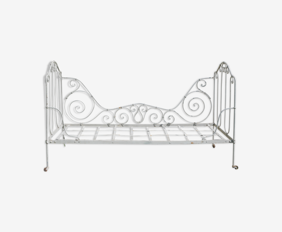 Old wrought iron bed bench