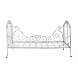 Old wrought iron bed bench