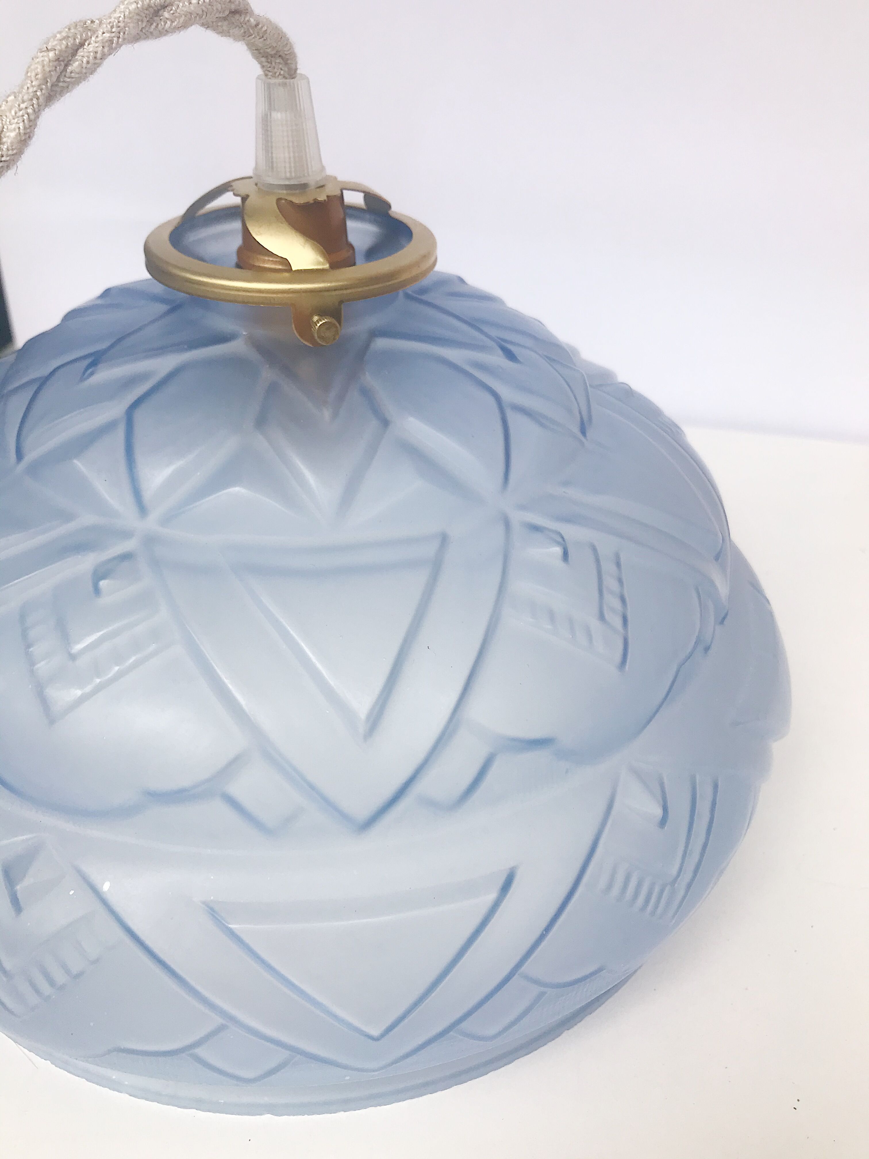 Blue Art Deco motif pendant light in pressed molded glass