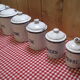 6 old spice pots in white and blue enamelled sheet metal