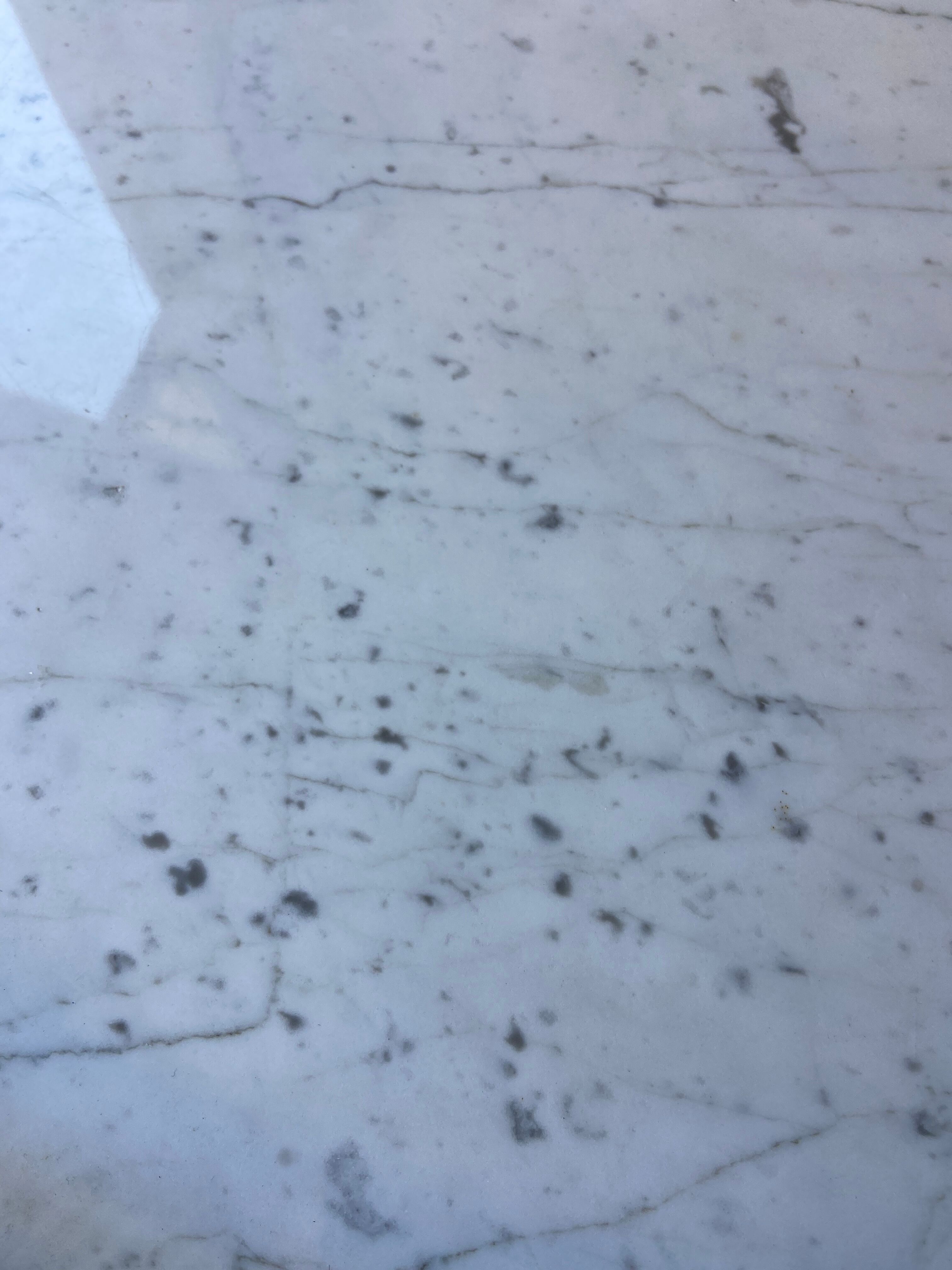 White marble hot water bottle table