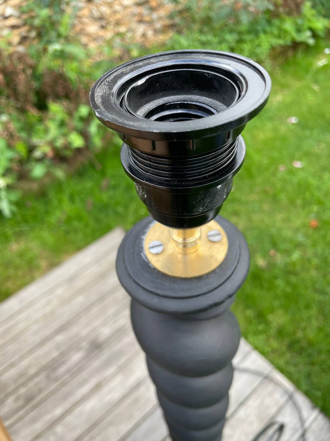 Pair of antique black twisted lamps