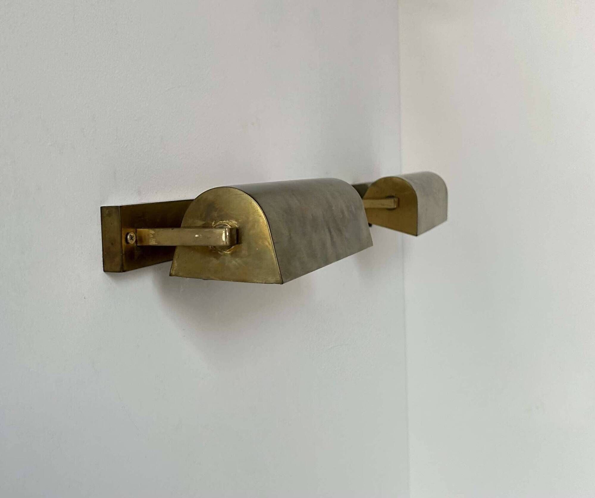Pair of vintage modernist wall lights, adjustable in brass, France 1940