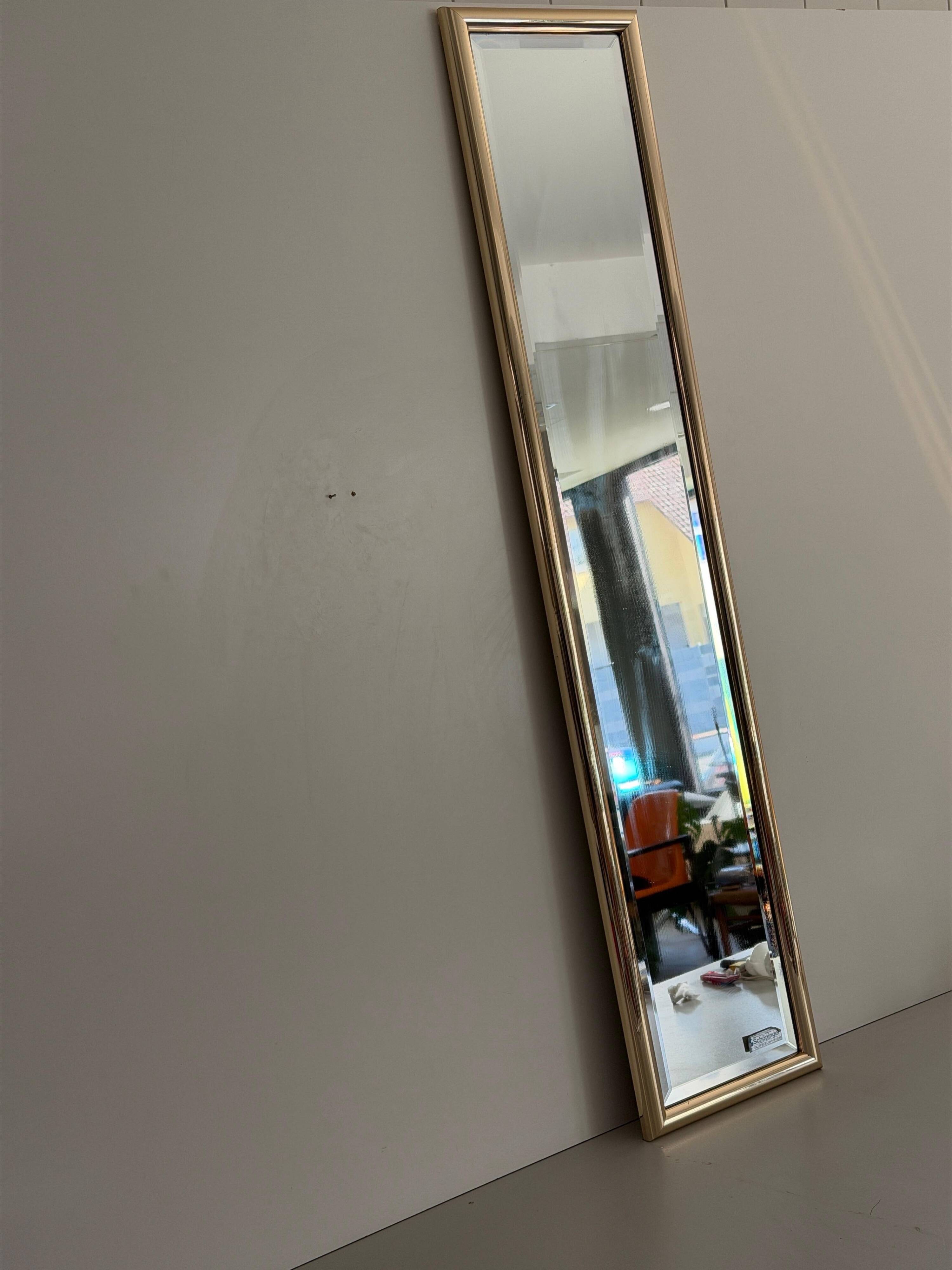 Rectangular wall mirror with a gold metal frame by Schöninger, 1970s, Germany.