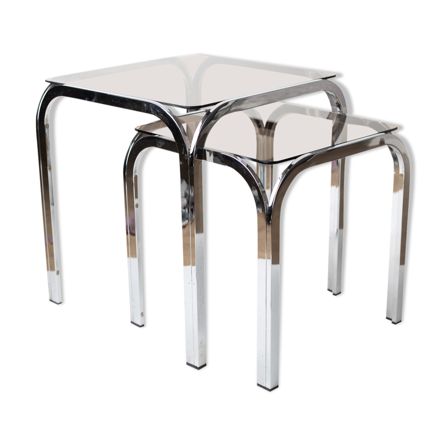 Pair of chrome nesting tables with smoked glass tops