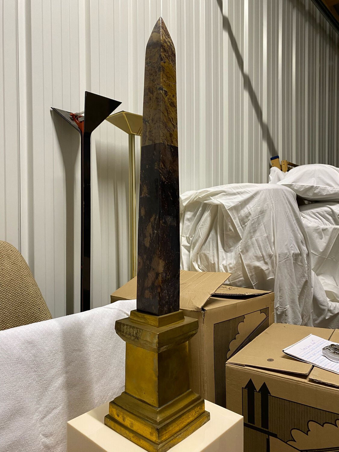 Obelisk stone brass base