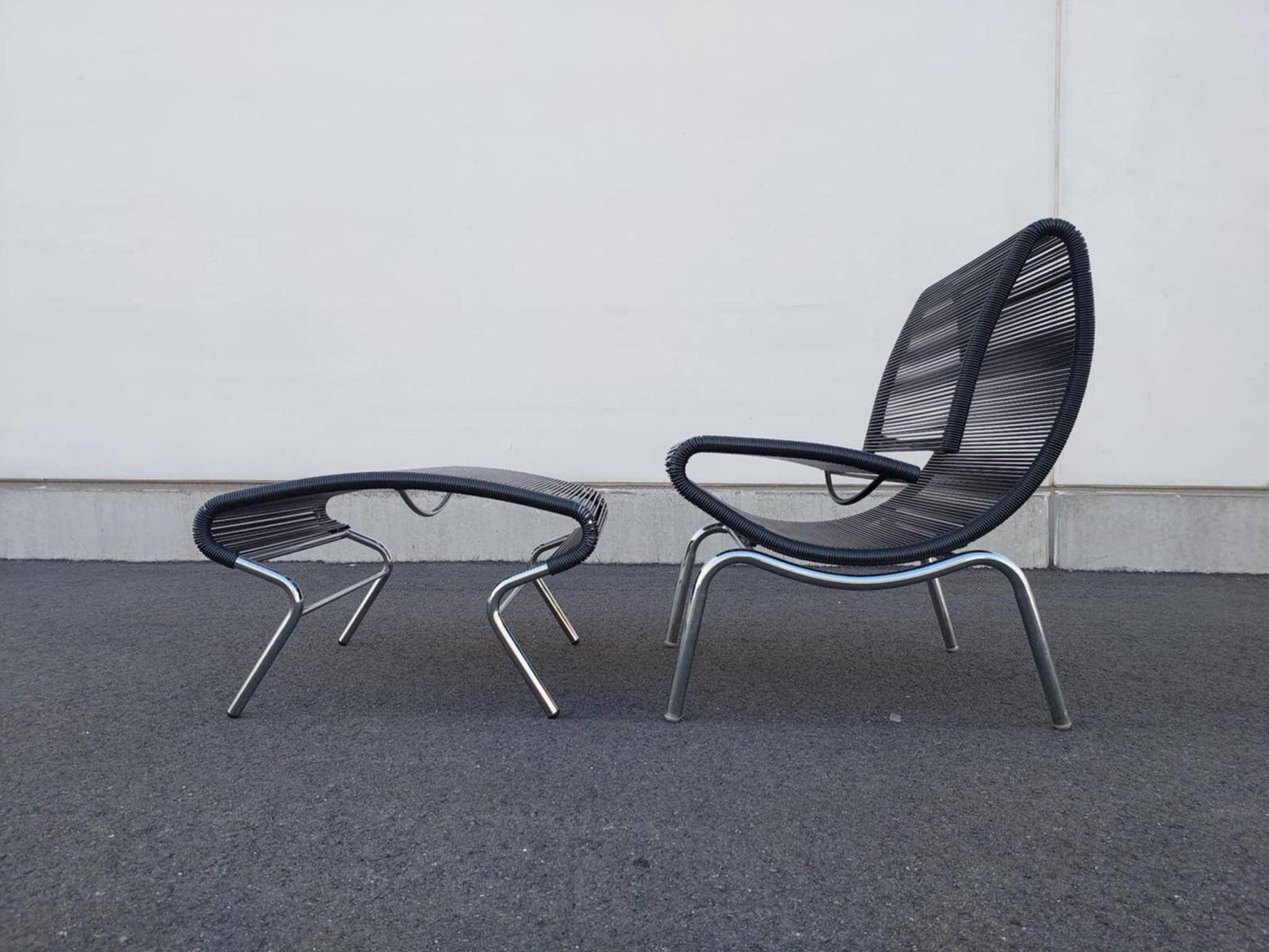Hygra chair and its ottoman by Roberto Semprini - Italy - 1990
