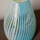 Blown glass vase with opal glass threads