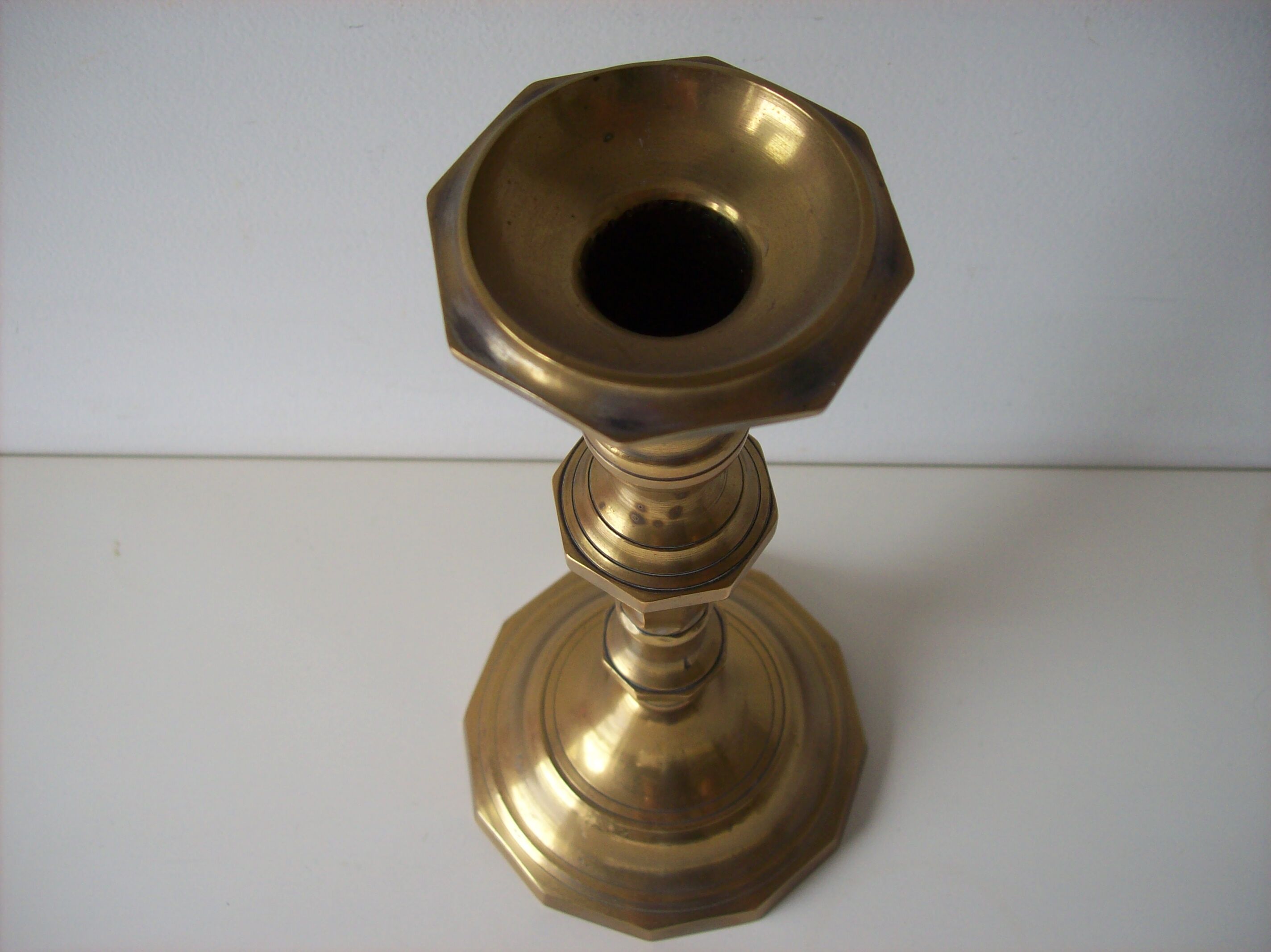 Former Golden brass candlestick