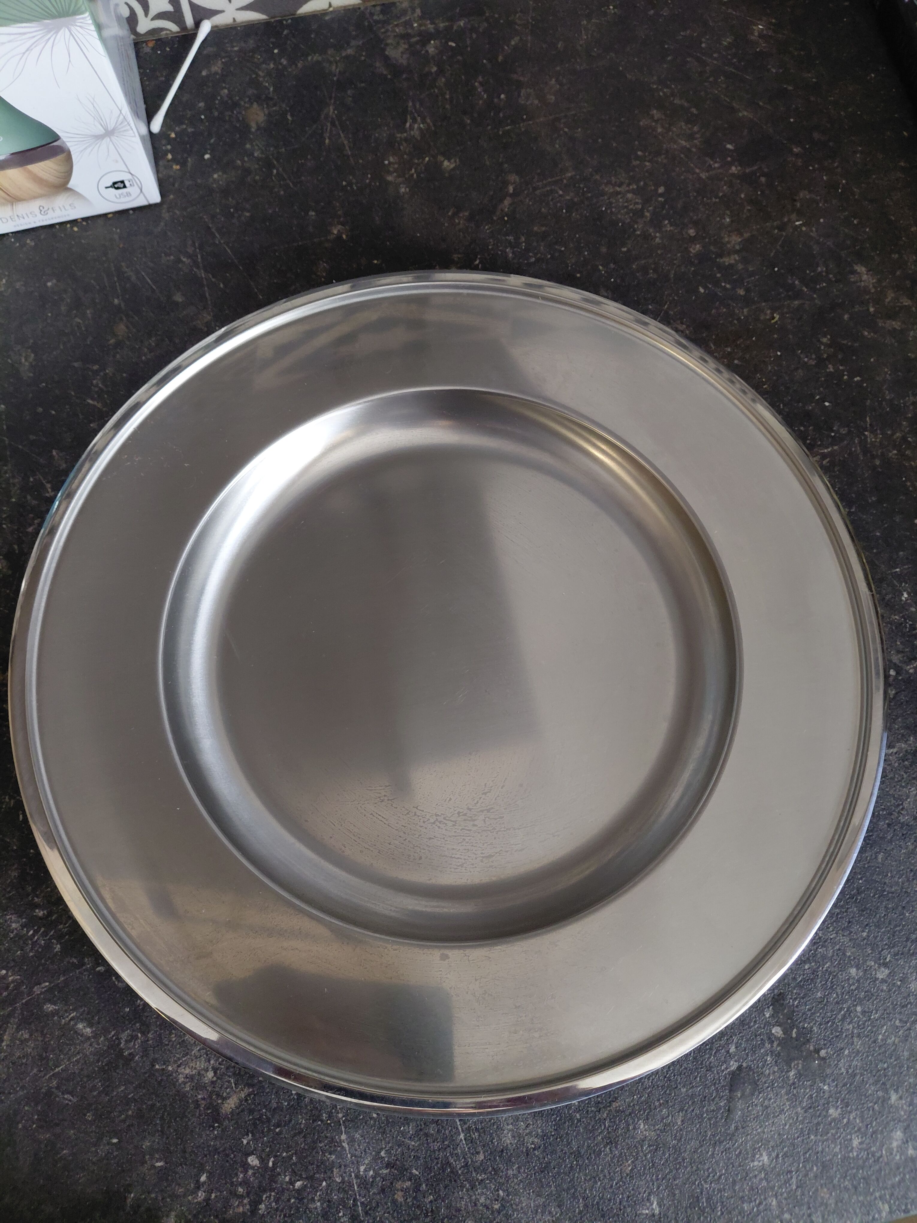 Shallow round plate Jean Couzon