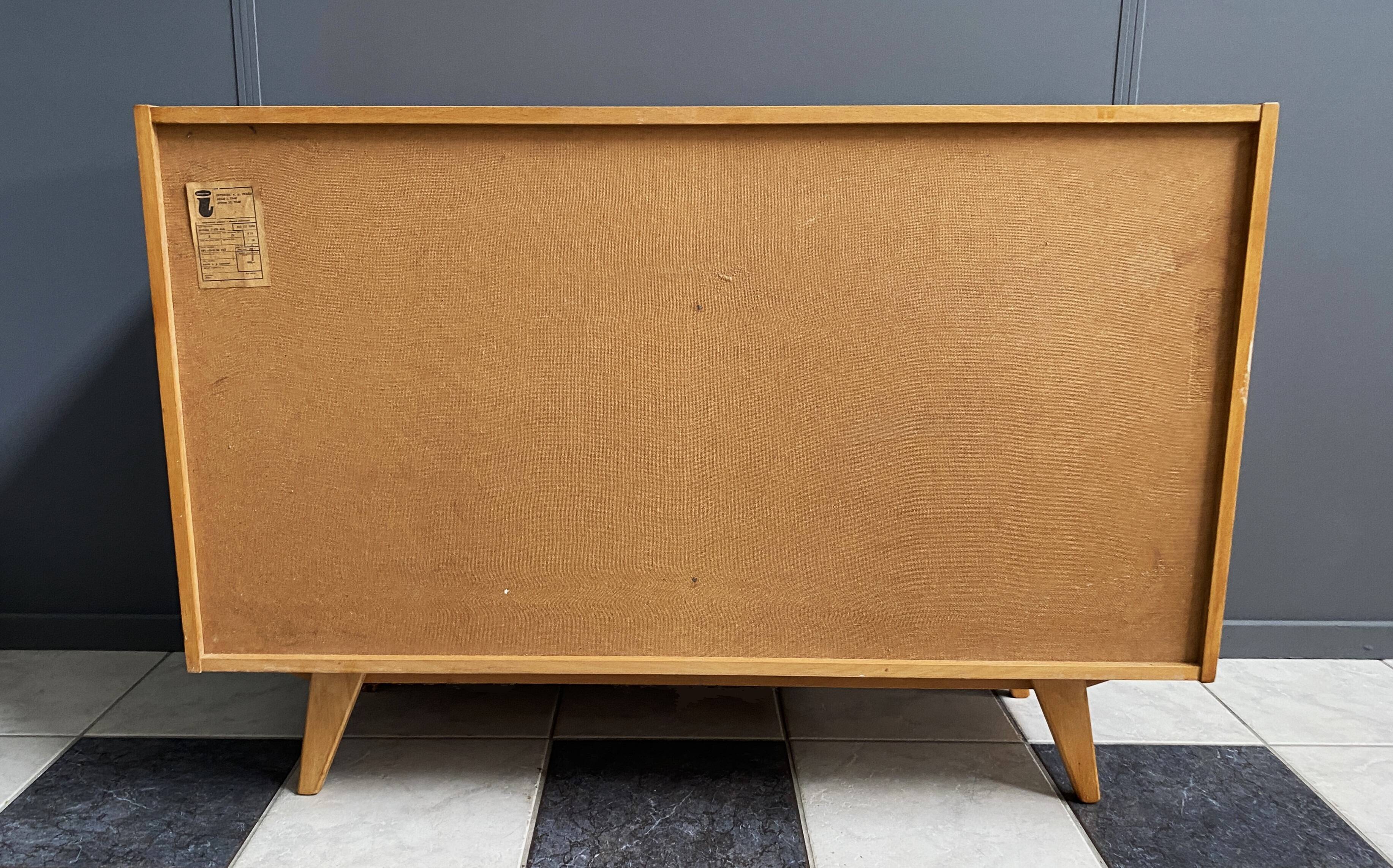 Blonde wood buffet Jiri Jiroutek, model U458 from the 1960s, with 4 drawers and a door.