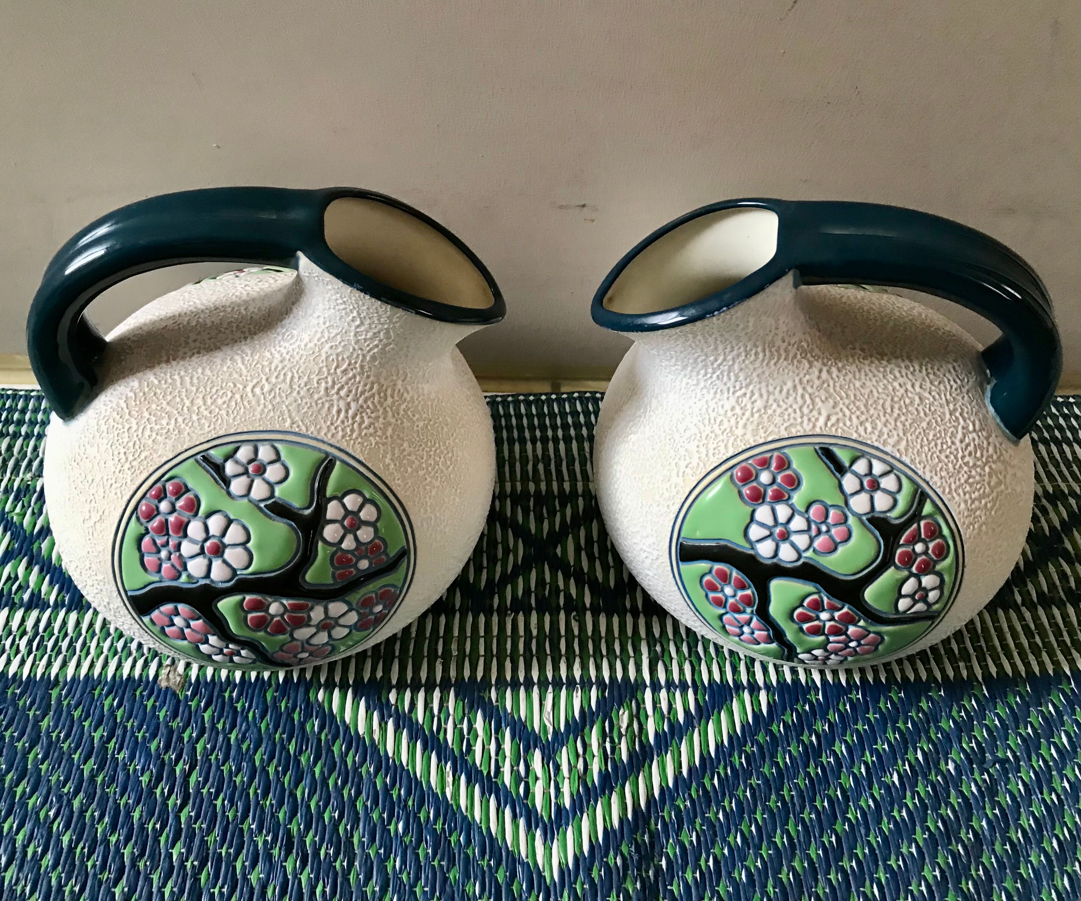 Pair of art deco pitchers
