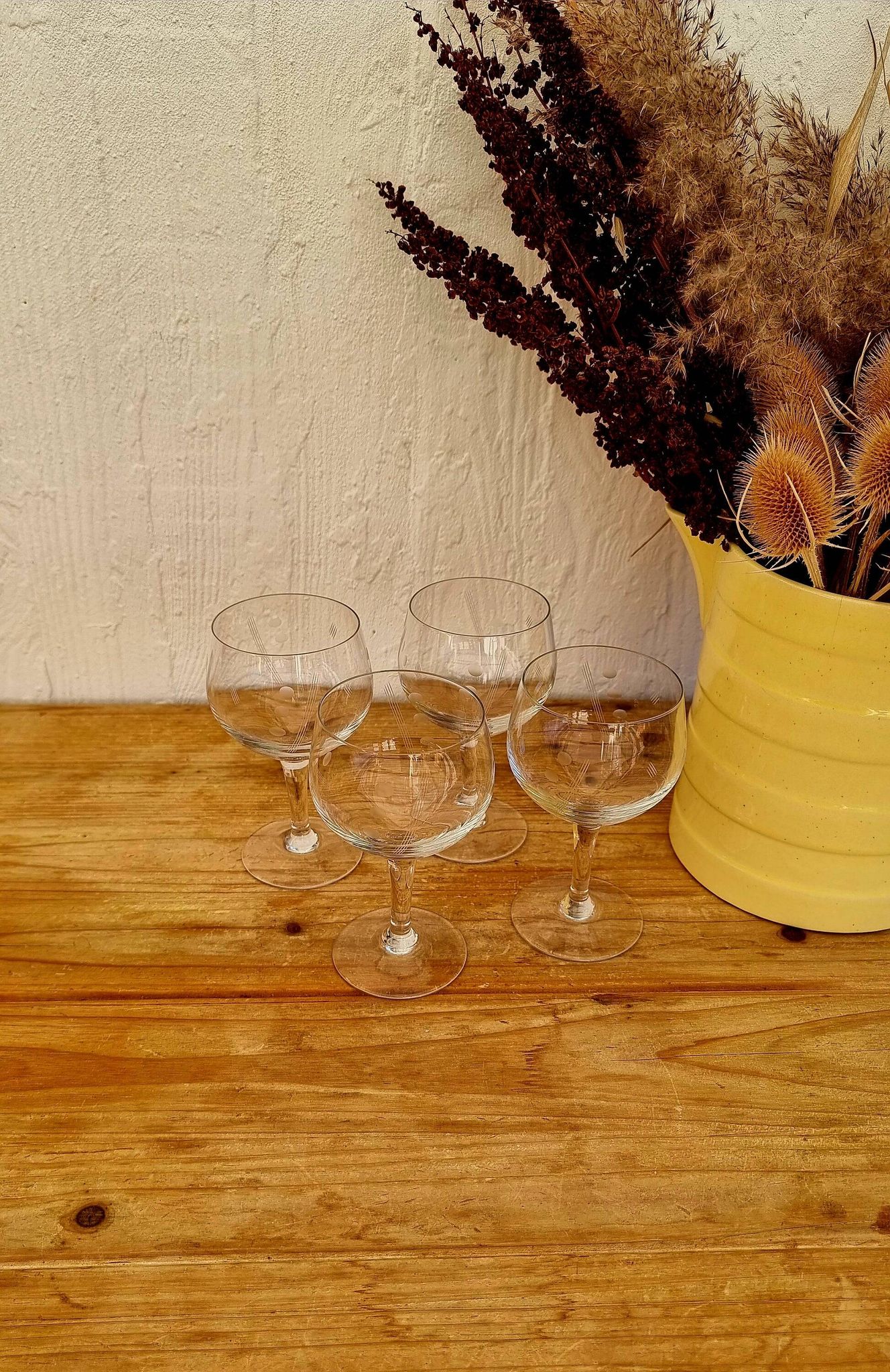 Set of 4 vintage engraved glass stemware from the 1950s.