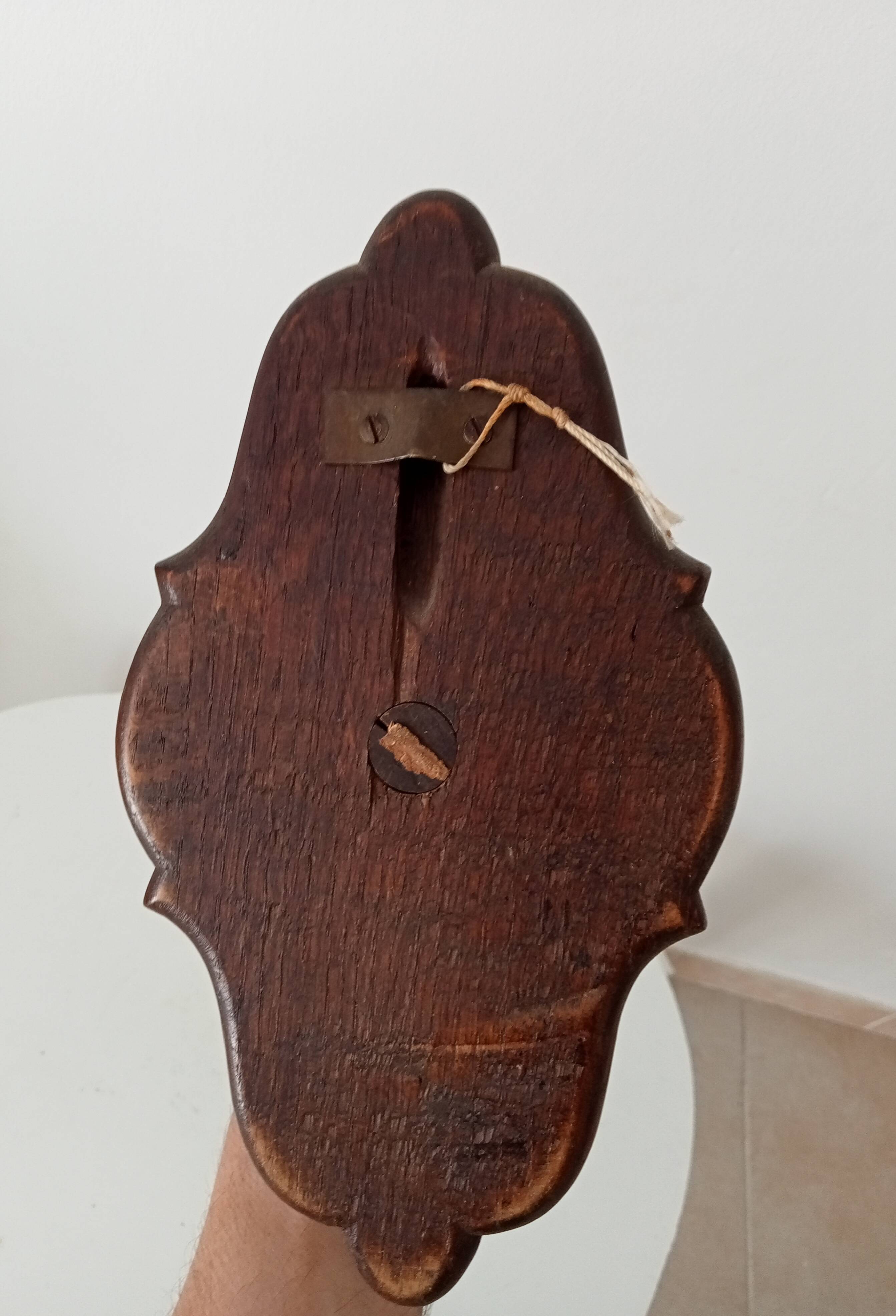 Vintage wall coat rack in carved solid wood, popular art.