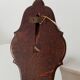 Vintage wall coat rack in carved solid wood, popular art.