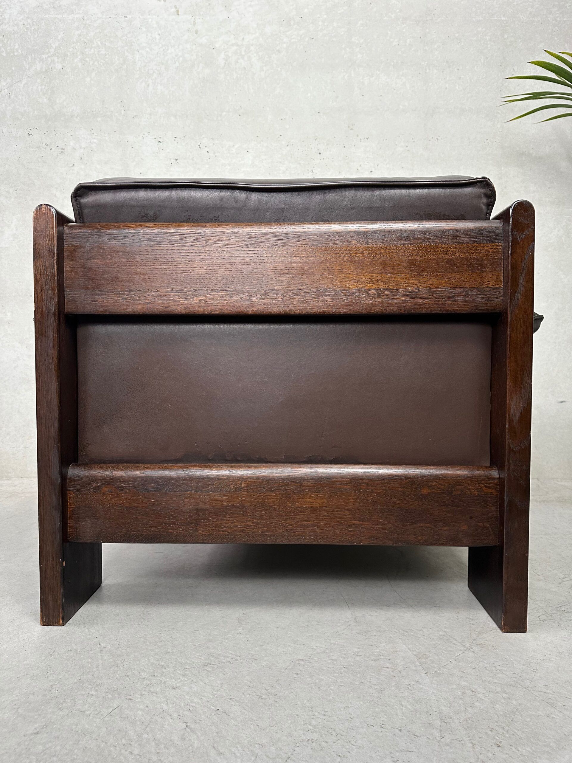 Vintage Leolux brown leather/oak lounge chair and ottoman by Harry de Groot – 1970