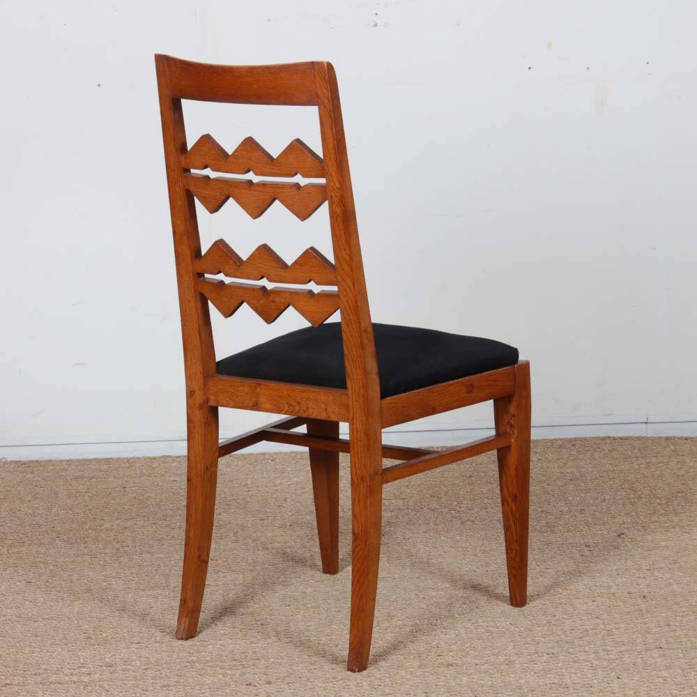 Set of 4 solid oak chairs from the 1950s.