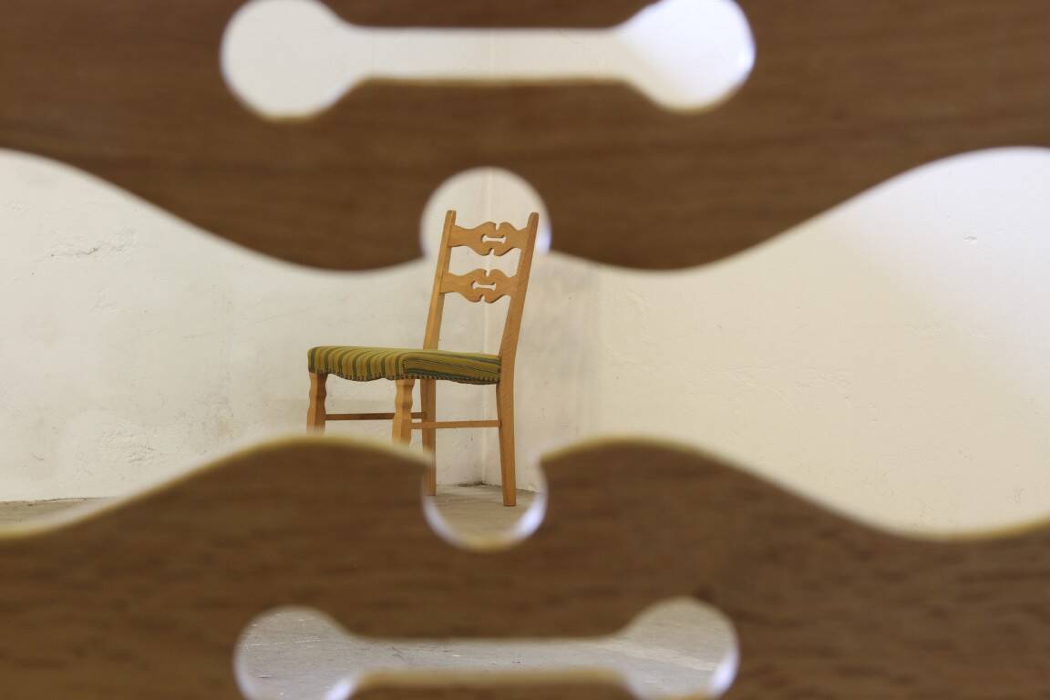 Vintage 1960s brutalist Danish modern oak dining chairs in the style of Henning Kjærnulf