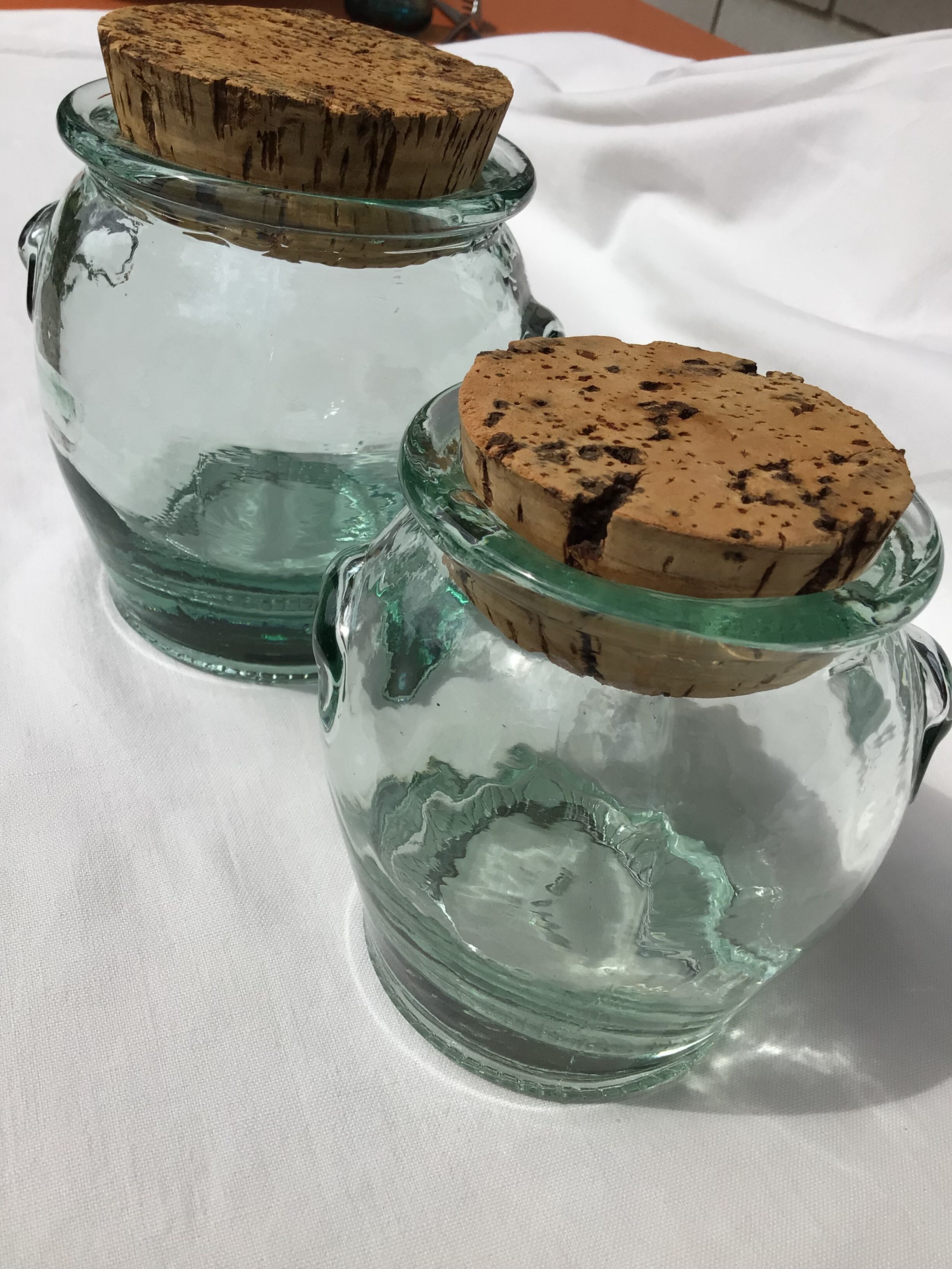 2 jars light green glass molded cork stopper