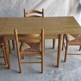 Wooden table with 2 extensions + 4 wooden chairs with rush seats