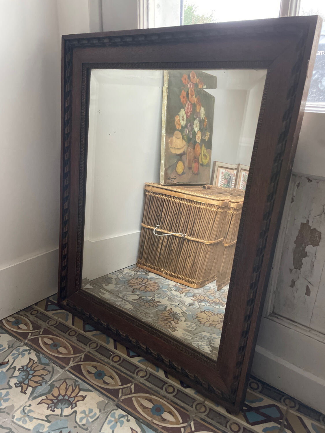 Carved beveled mirror