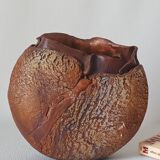 Signed textured terracotta vase