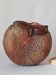 Textured terracotta vase signed