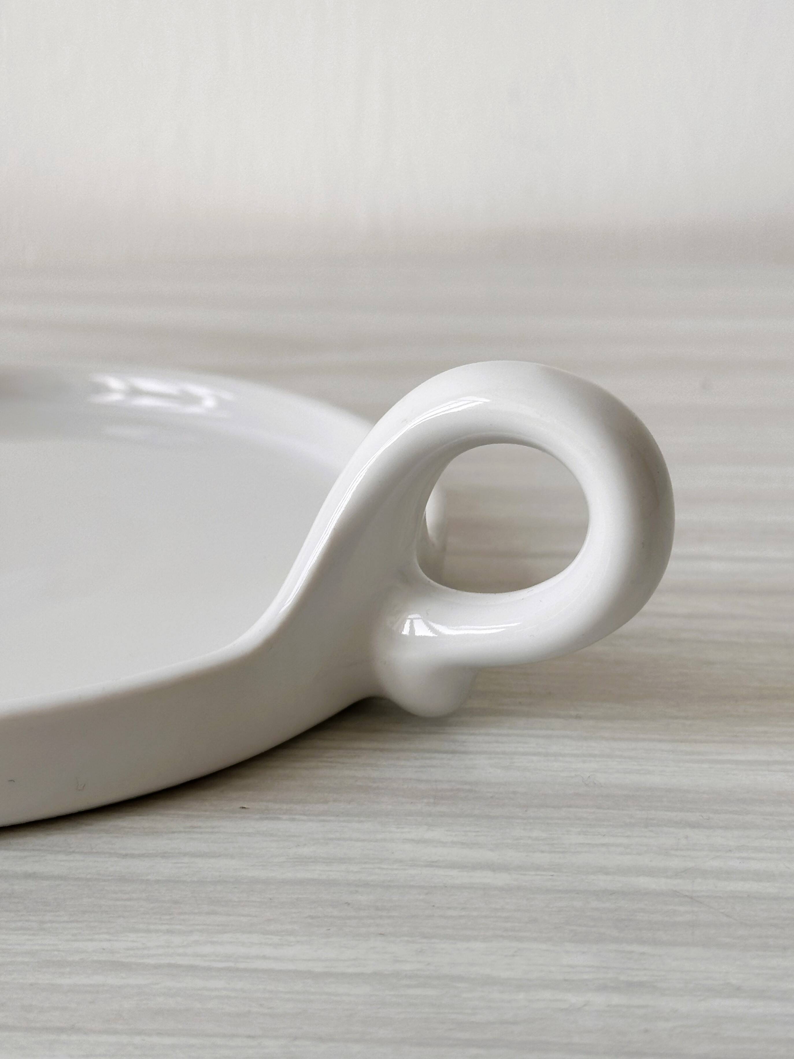 Revol porcelain cow cheese display