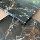 Coffee table made up of two designer tables in faux marble resting on chrome legs by Willy Rizzo.