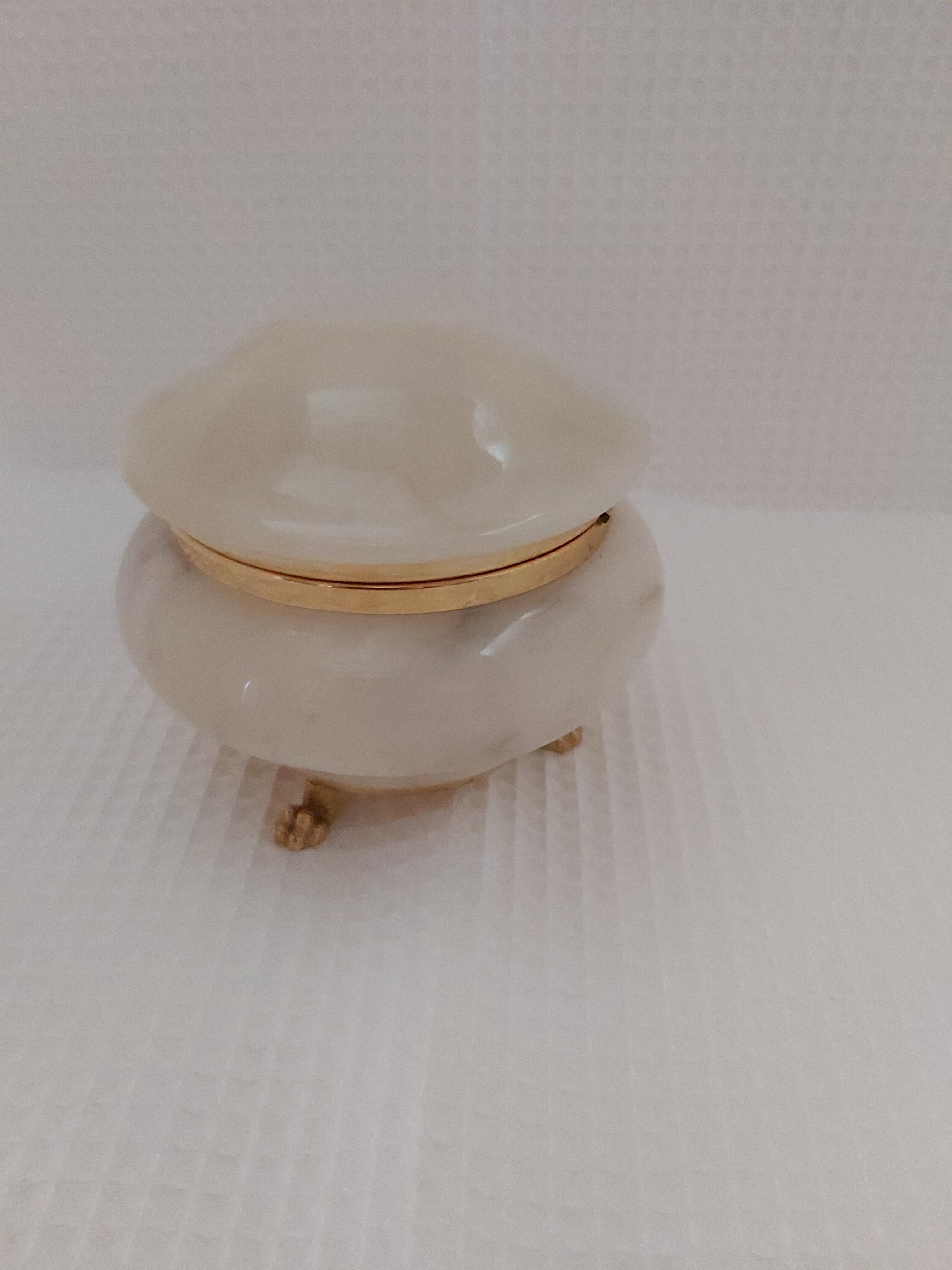 Ivory-colored alabaster box on feet