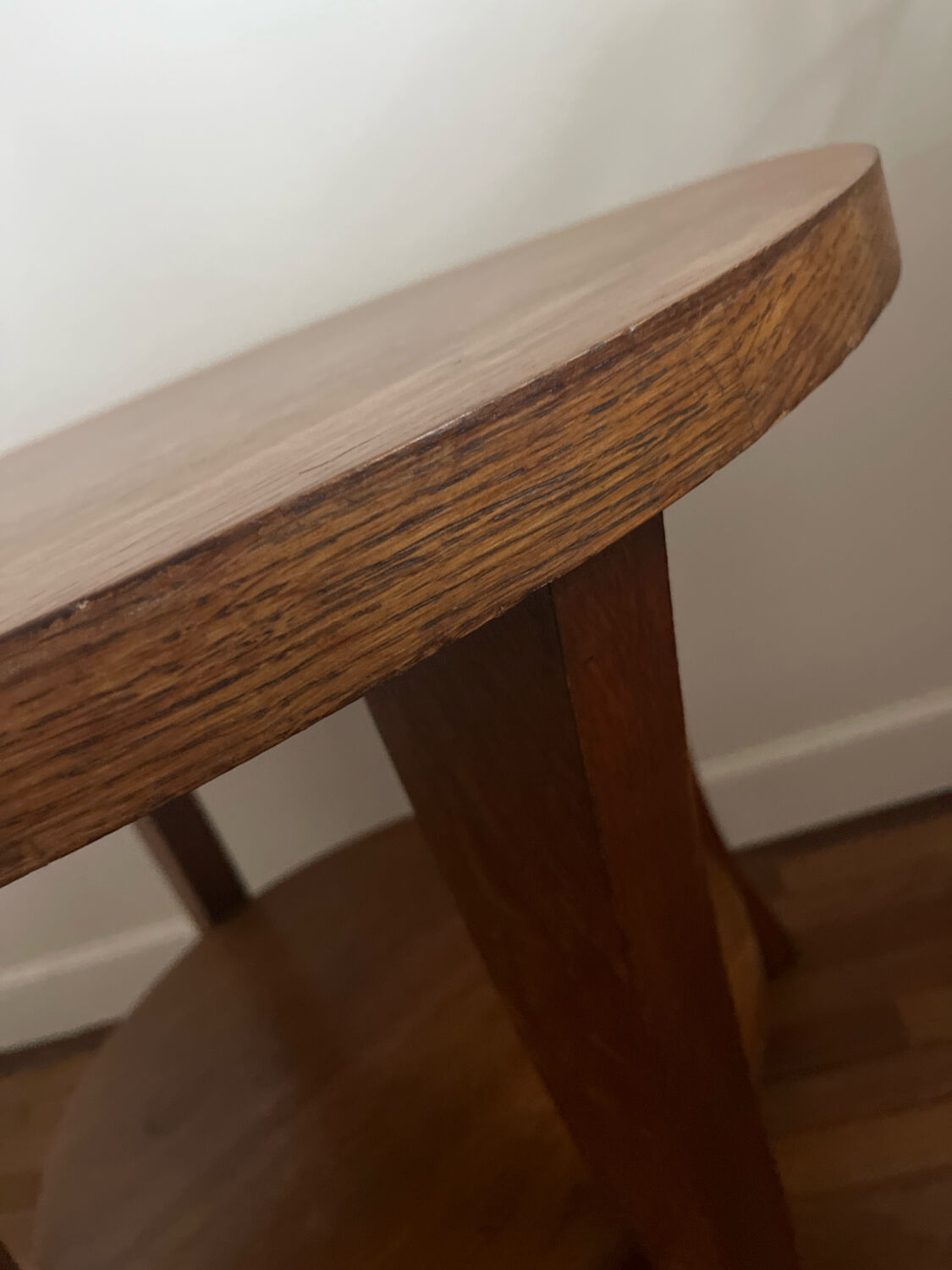 Low round art deco table in honey wood